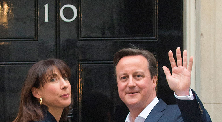 David Cameron in Downing Street after election victory for story Photo: PA David Cameron is set to remain prime minister as the Conservatives close in on an overall majority in the House of Commons following the general election.