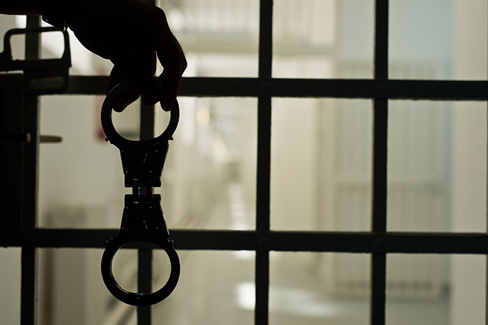 Handcuffs prison ISTOCK Handcuffs in a prison