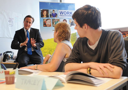 David Cameron visits one of the government’s Work Programme schemes as he backs an extension of payment by result contracts in the public sector.