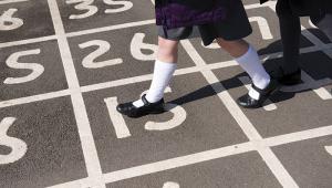 Child playing hopscotch