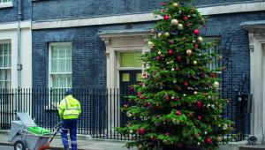 Rubbish collector outside number 10 