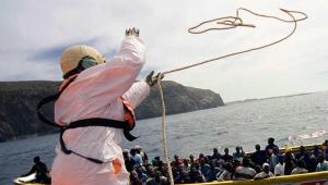 Migrants in the Med in a boat 