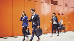 Technology watch people using mobile devices iStock