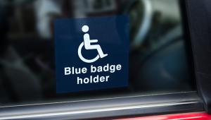 Blue badge holder sign