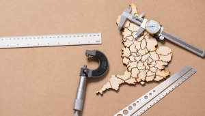 credit_richard-gleed Wooden England map, rulers, caliper, micrometer, measurement tools.