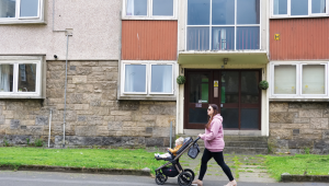 Mother pushing buggy - Credit: Istock - 1414596921
