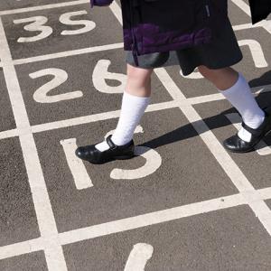 Child playing hopscotch