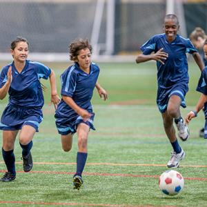 Kids playing football