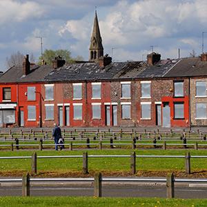 The government has agreed to write-off the historical housing stock debt of Salford City Council as part of moves to transfer ownership of the properties to Salix social housing company.