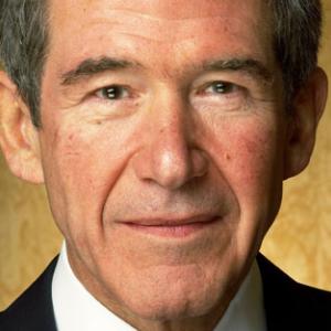 Finance standards in Whitehall are inconsistent, unclear and hindering reform, the government's lead non-executive director Lord Browne said today.