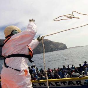 Migrants in the Med in a boat 