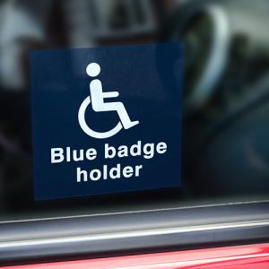 Blue badge holder sign