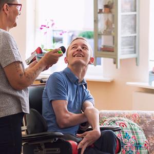 Disabled person with helper