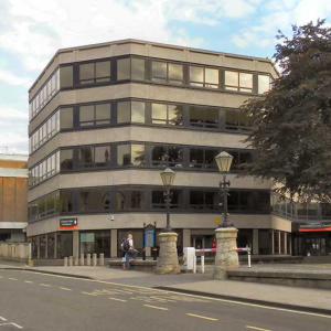 Oxfordshire council is to consider options to become a unitary authority in a review that will examine whether reorganisation could help reduce costs and protect vital services.