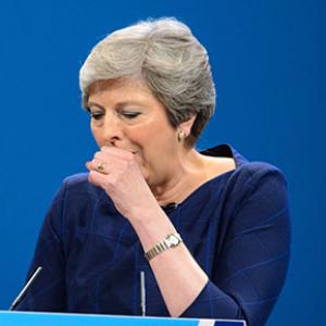 Theresa May coughing