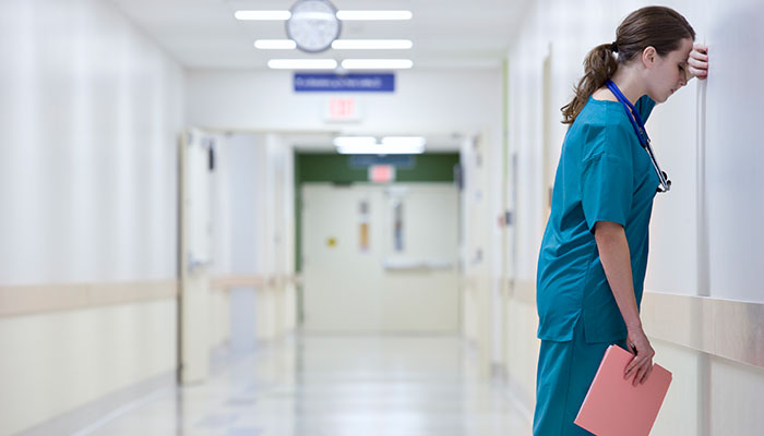 NHS: stressed doctor NHS: stressed doctor
