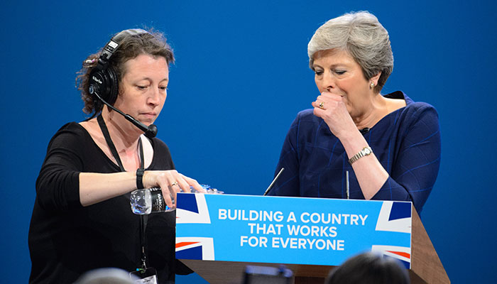 Theresa May coughing